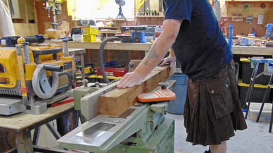 A men wearing a utility kilt and doing his job